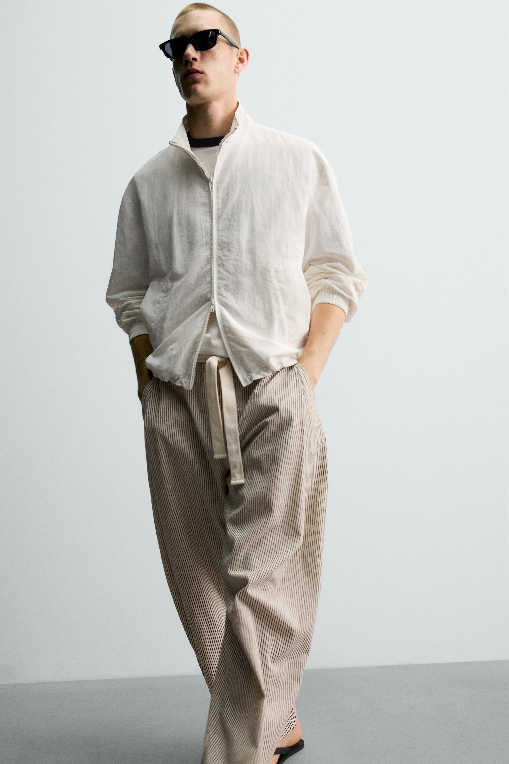 STRIPED WIDE FIT BELTED PANTS